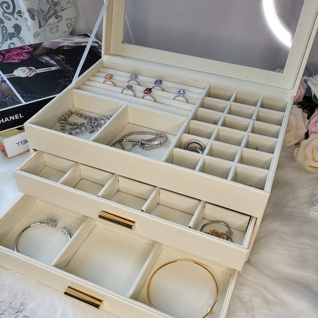 boîte à bijoux avec tiroirs spacieux